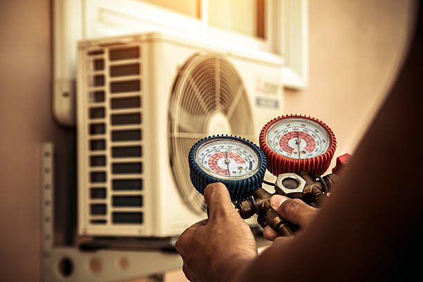 Professional Heat Pump Repair technician working in Mc Louth, KS